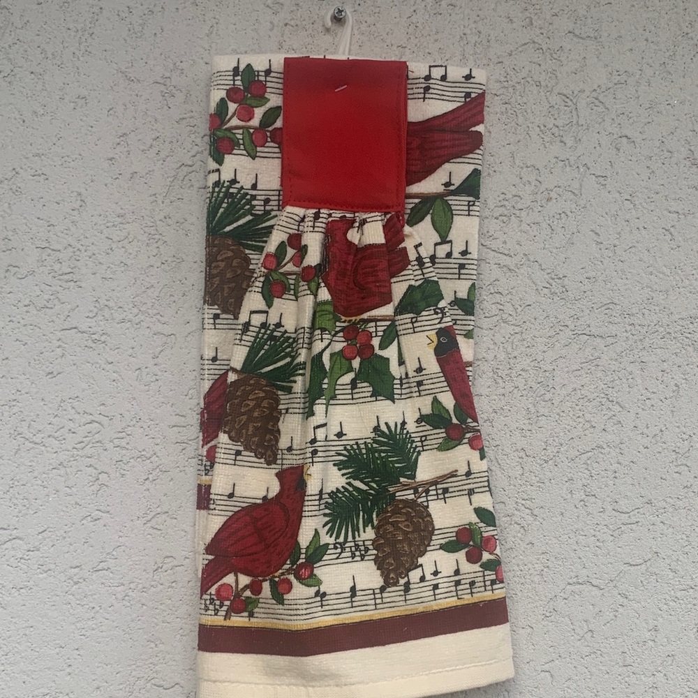 Kitchen towel set of 2. Creamy white with Cardinal, pine, and music design.